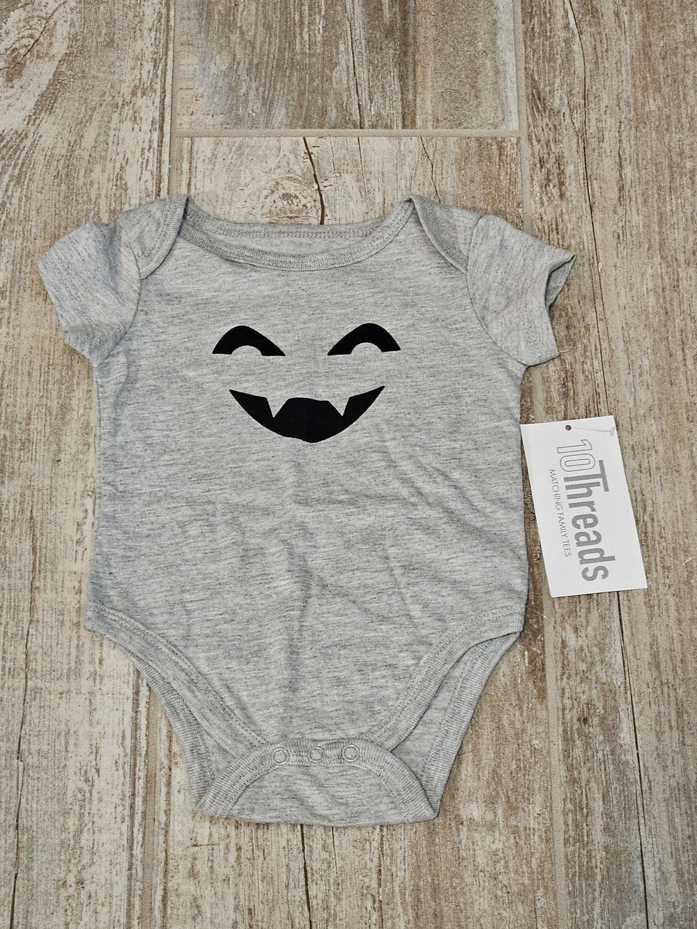Gray Baby One-Piece with Playful Vampire Smile